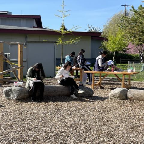 Students using the seating area for work